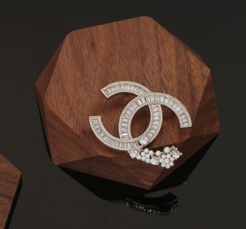 Ch**el brooches